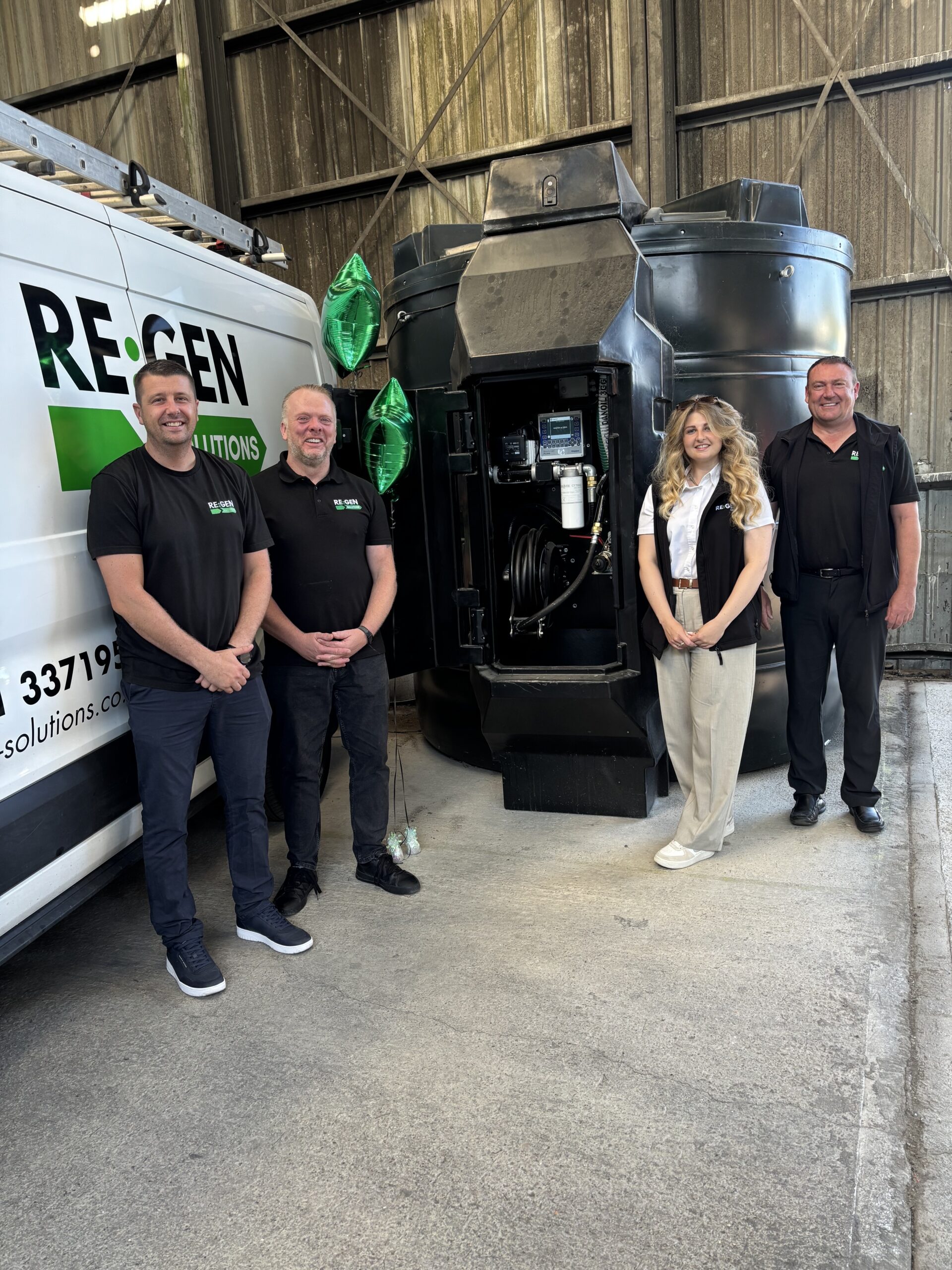 members of regen solutions team stand in front of the new hVO fuelling station